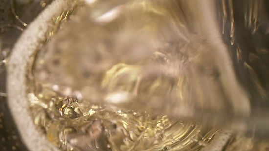 Camera motion, pouring champagne into flute